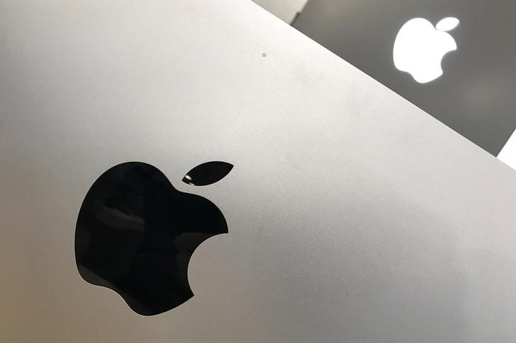 FILE PHOTO: An Apple logo is seen in a store in Los Angeles