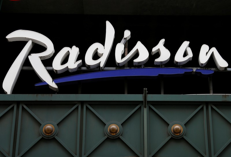 FILE PHOTO: The logo of Radisson hotel group is pictured over its main entrance in central Brussels