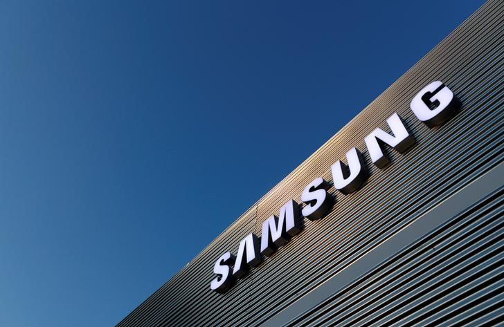 FILE PHOTO: The logo of Samsung is seen on a building during the Mobile World Congress in Barcelona