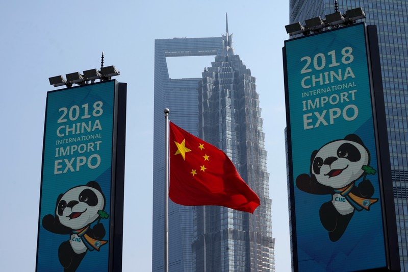 Signs promoting the upcoming China International Import Expo (CIIE) are seen at Lujiazui financial district in Pudong, Shanghai
