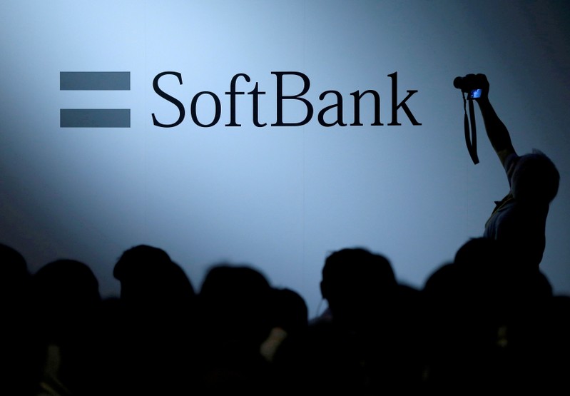 FILE PHOTO: The logo of SoftBank Group Corp is displayed at the SoftBank World 2017 conference in Tokyo