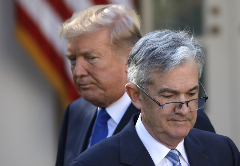 U.S. President Donald Trump looks on as Jerome Powell, his nominee to become chairman of the U.S. Federal Reserve moves to the podium at the White House in Washington