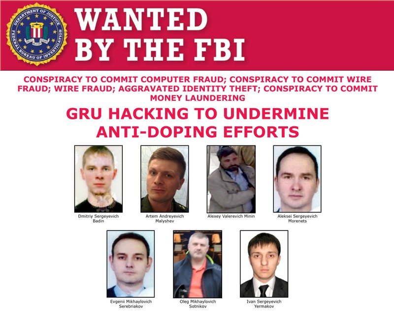 A U.S. Federal Bureau of Investigation (FBI) poster shows photographs of seven men identified as Russian intelligence officers who were indicted in Washington