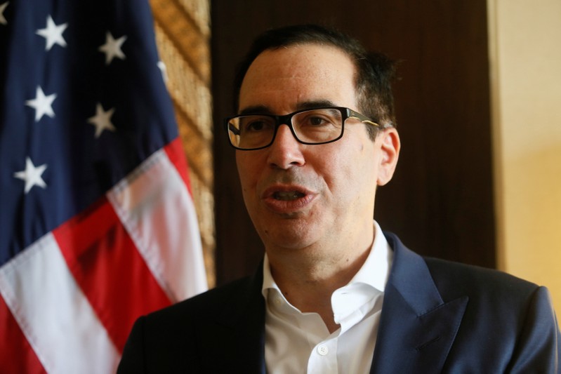 United States Secretary of the Treasury Steven Mnuchin speaks during an interview with Reuters at the International Monetary Fund - World Bank Annual Meeting 2018 in Nusa Dua