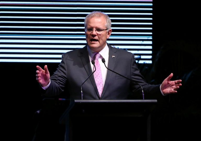 Australian leader promises first budget surplus in a decade