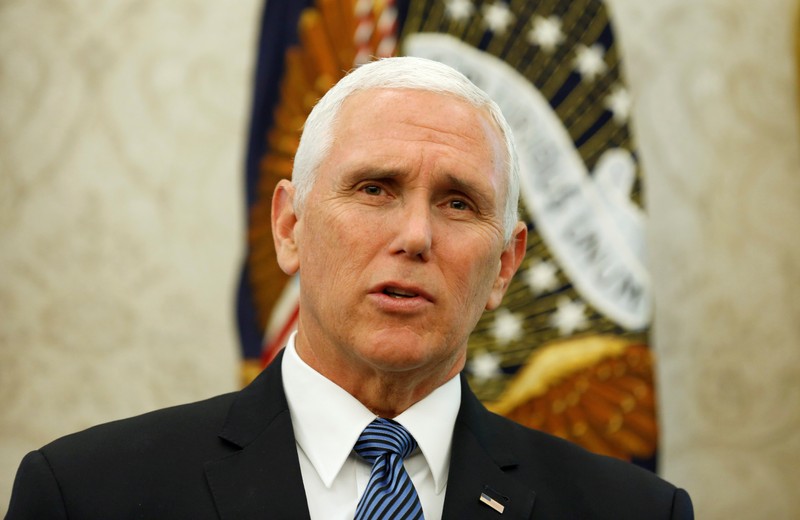 U.S. Vice President Mike Pence speaks during an event in the Oval Office of the White House in Washington