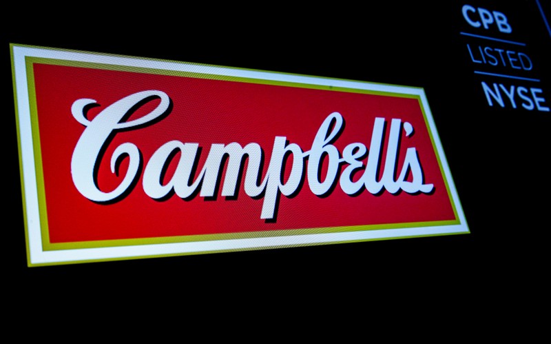 FILE PHOTO: The logo and ticker for Campbell Soup Co. are displayed on a screen on the floor of the NYSE in New York