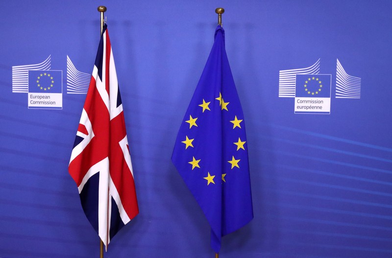 British and EU flags are seen before Britain's Prime Minister Theresa May meets with Commission President Jean-Claude Juncker to discuss draft agreements on Brexit, at the EC headquarters in Brussels