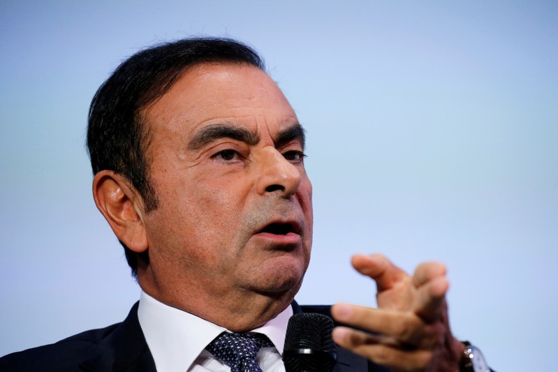 FILE PHOTO: Carlos Ghosn, chairman and CEO of the Renault-Nissan-Mitsubishi Alliance, speaks at the Tomorrow In Motion event on the eve of press day at the Paris Auto Show, in Paris