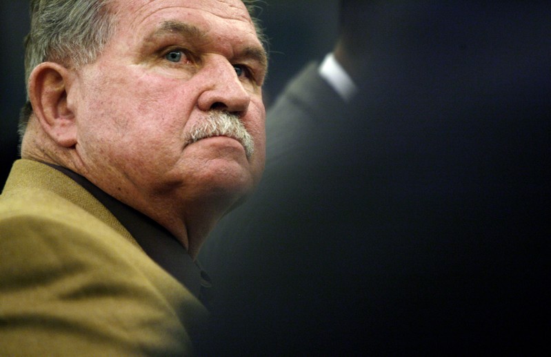 Former NFL player and coach Mike Ditka listens during a hearing on Capitol Hill in Washington