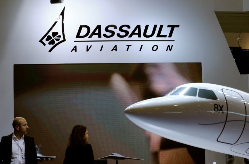 A Dassault Aviation logo is pictured on the company booth during the European Business Aviation Convention & Exhibition (EBACE) at Cointrin airport in Geneva