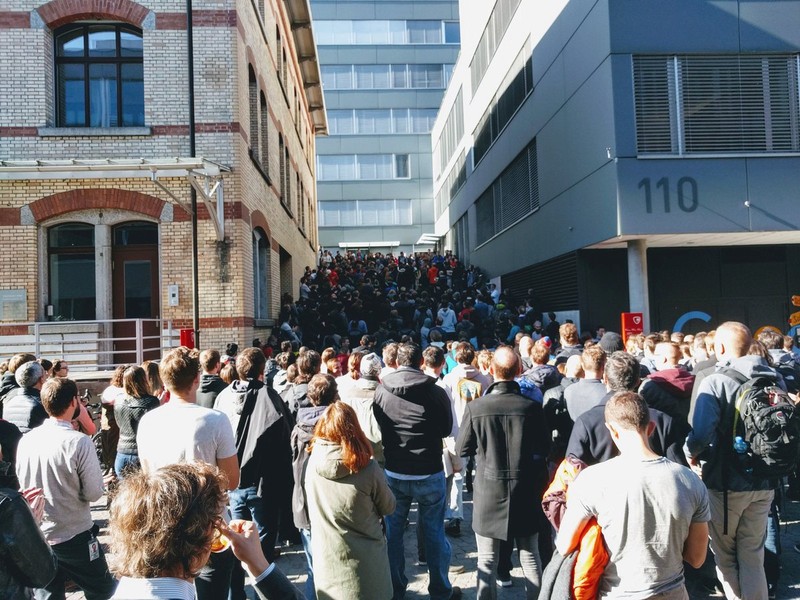 People gather next to the Google office to attend the Google Walkout in Zurich