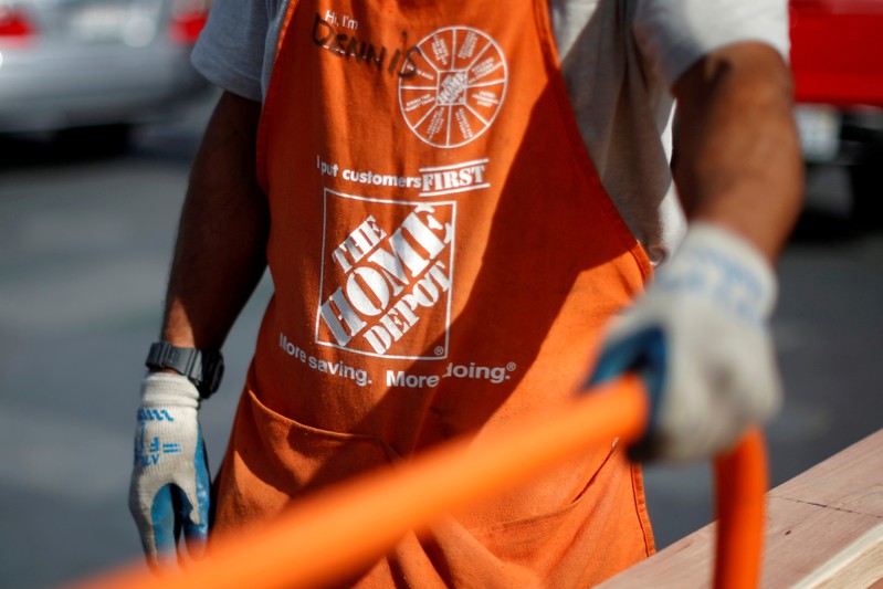 FILE PHOTO - A Home Depot employee is seen outside a store in Los Angeles