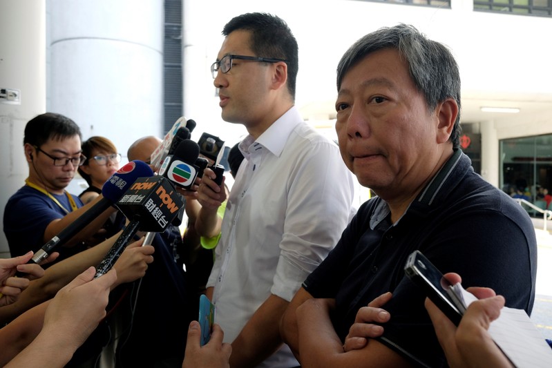 FILE PHOTO: Pro-democracy lawmaker Lam and Democratic Party member Lee meet journalists in Hong Kong