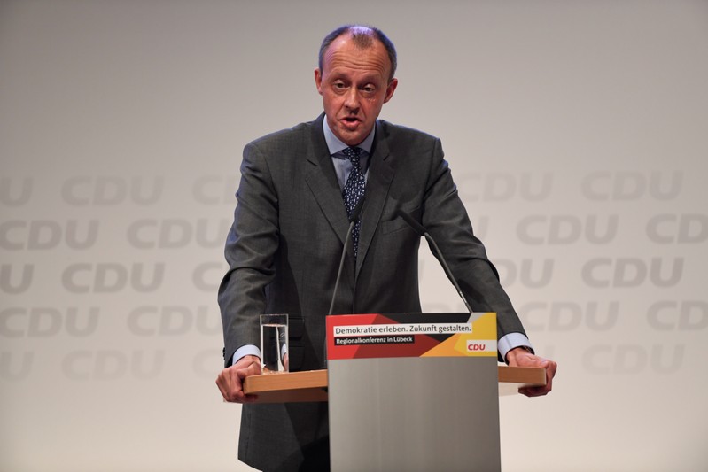Christian Democratic Union (CDU) candidate Merz speaks at a regional conference in Luebeck
