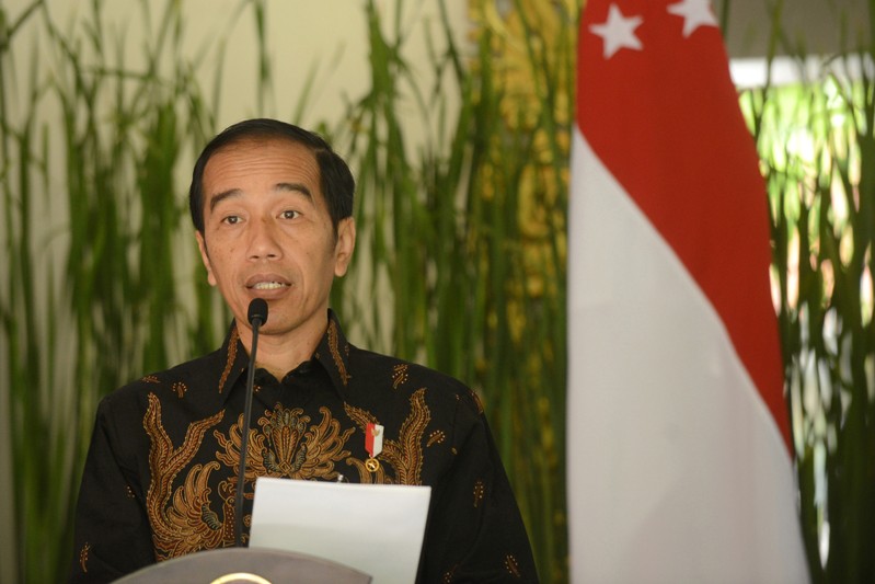 Indonesia president Joko Widodo speaks to journalist after bilateral meeting with Singapore during the International Monitary Fund and World Bank annual meetings in Nusa Dua