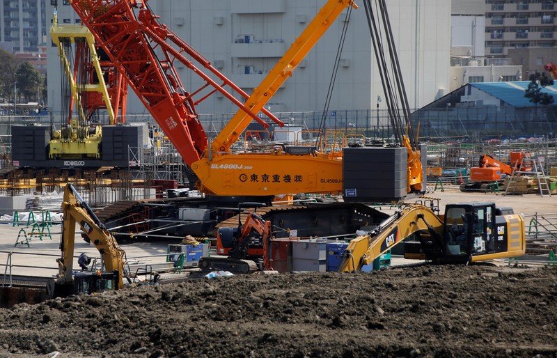 Heavy machines are seen at a construction site in Tokyo