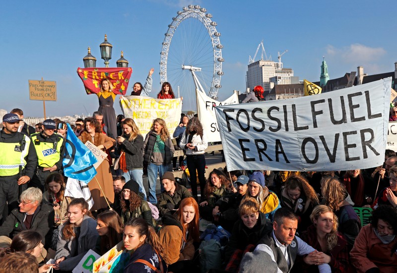 Environmental campaigners from the direct action group Rebellion demonstrate on Westminster Bridge in central London