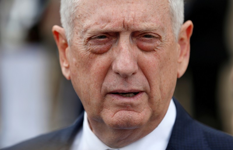 FILE PHOTO: Secretary of Defense Jim Mattis speaks with the media before an enhanced honor cordon arrival of Greek Minister of Defense Panagiotis Kammenos at the Pentagon in Washington