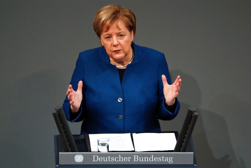 German Chancellor Angela Merkel speaks during a session at the lower house of parliament Bundestag in Berlin