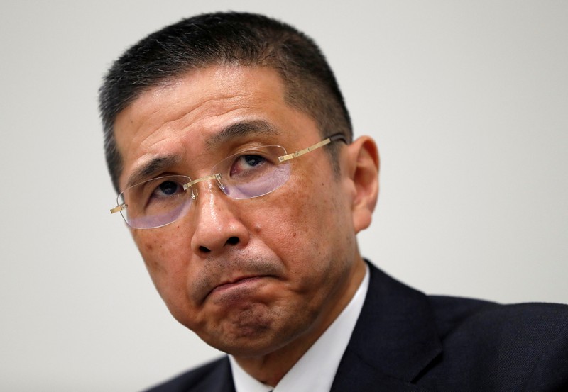 FILE PHOTO - Nissan President and CEO Saikawa reacts during a news conference after Japanese media reported that Nissan Chairman Carlos Ghosn will be arrested in Yokohama