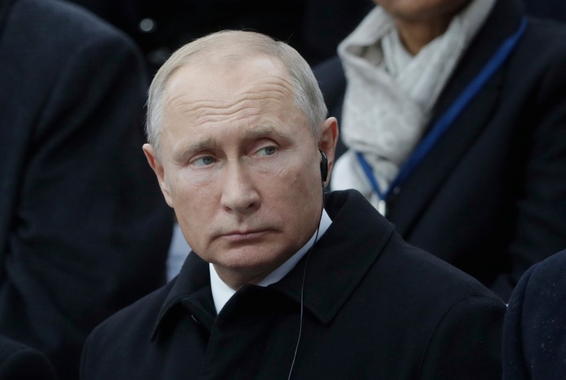 Russian President Vladimir Putin attends a commemoration ceremony for Armistice Day in Paris