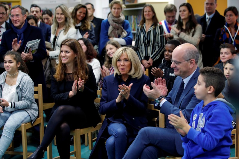FILE PHOTO: Brigitte Macron, wife of French President, French Education Minister Jean-Michel Blanquer and Marlene Schiappa, French Junior Minister for Gender Equality, visit a high school to discuss the fight against school bullying in Clamart
