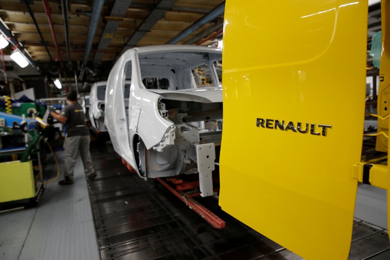 An employee works on the production and quality control line of the Renault Kangoo car at the Renault Maubeuge Construction Automobile factory in Maubeuge