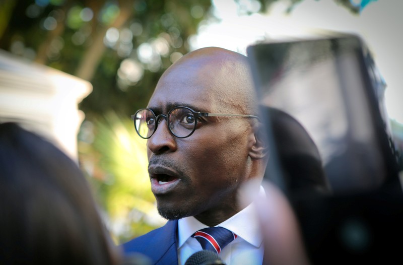 FILE PHOTO: Finance Minister Malusi Gigaba speaks to members of the media at Parliament before the State of the Nation Address by South African president Cyril Ramaphosa in Cape Town