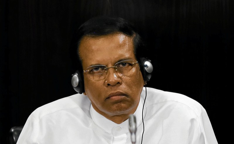 FILE PHOTO: Sri Lanka's President Maithripala Sirisena listens to a speech during a Parliament session marking the 70th anniversary of Sri Lanka's Government, in Colombo