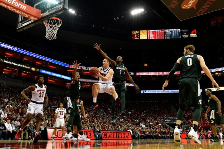 Top 25 roundup: Louisville upends No. 9 Michigan State