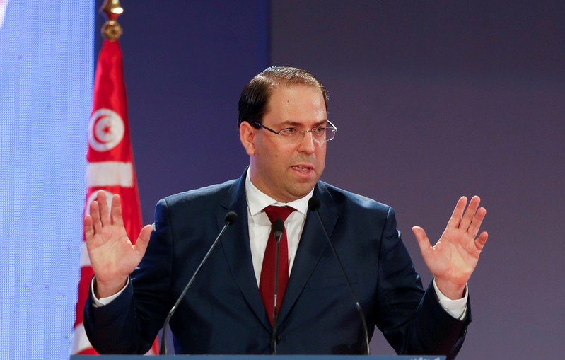 FILE PHOTO: Tunisia's Prime Minister Youssef Chahed speaks during a national conference over 2019 budget in Tunis