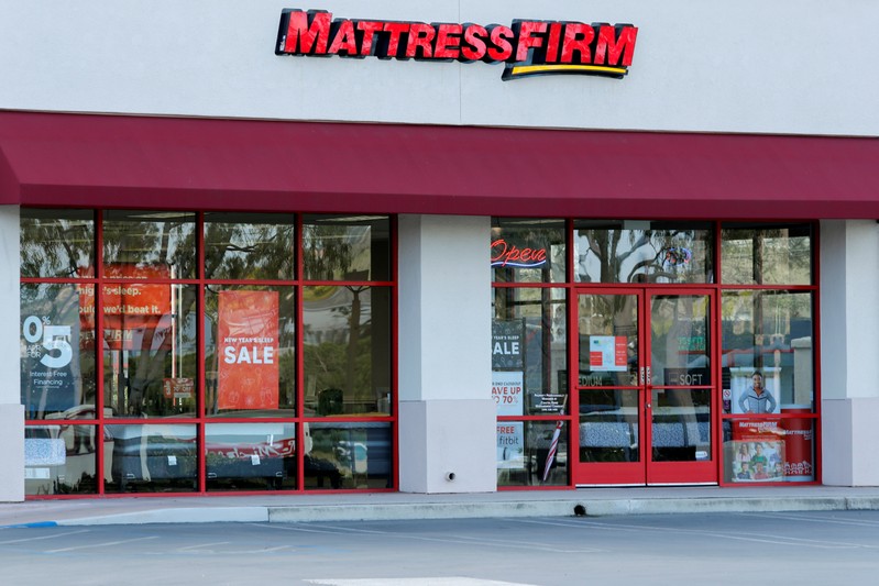 A Mattress Firm store is shown in Encinitas, California