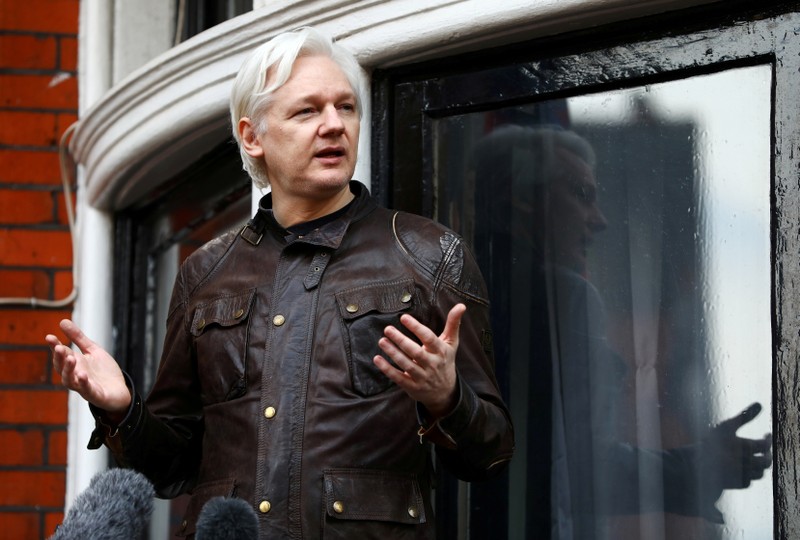 FILE PHOTO - WikiLeaks founder Julian Assange is seen on the balcony of the Ecuadorian Embassy in London, Britain