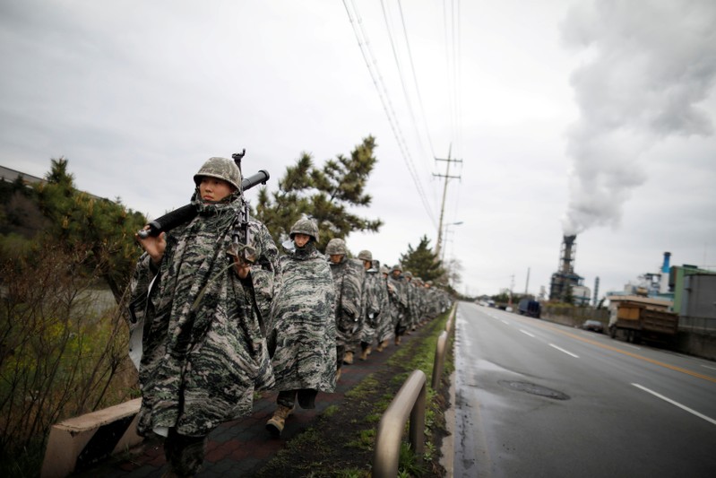 FILE PHOTO: South Korean marines march during a military exercise as a part of the annual joint military training called Foal Eagle between South Korea and the U.S. in Pohang