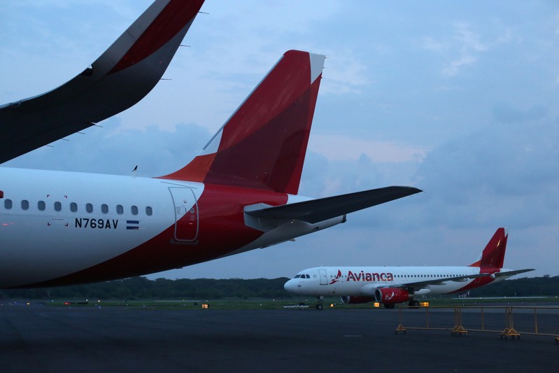 AVIANCA airplanes are seen on the tarmac during a presentation ceremony of a new aircraft at Monsenor Oscar Arnulfo Romero International Airport in San Luis Talpa