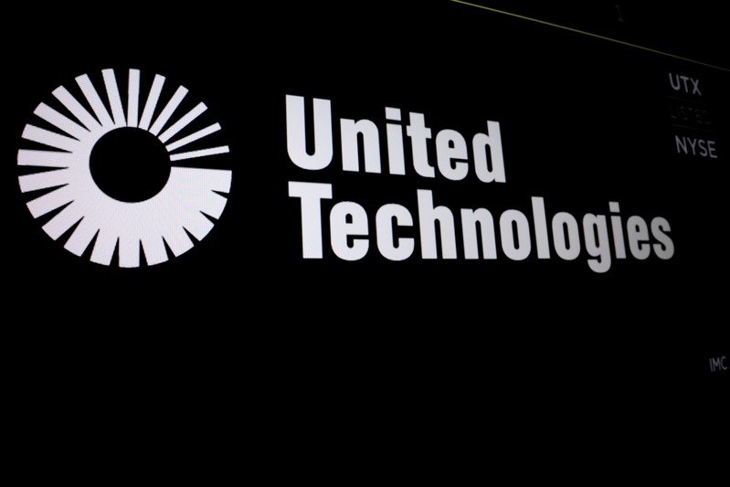 FILE PHOTO: United Technologies logo is displayed on a screen at the post where it's stock is traded on the floor of the NYSE in New York