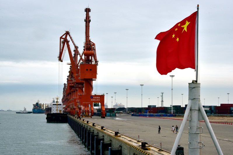 A Chinese national flag is seen at a port in Beihai
