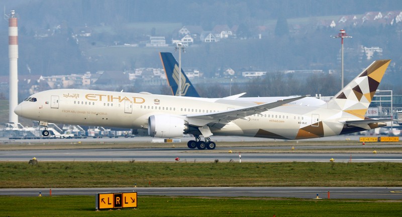 FILE PHOTO: Etihad Boeing 787 Dreamliner aircraft takes off from Zurich Airport