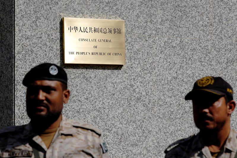 FILE PHOTO: Paramilitary soldiers stand guard outside, after an attack on the Chinese consulate, in Karachi