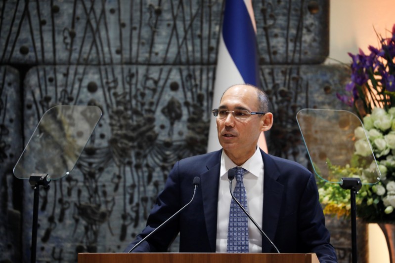 Amir Yaron speaks during a ceremony whereby he is sworn in as Bank of Israel governor by Israel's President Reuven Rivlin, in the presence of Prime Minister Benjamin Netanyahu and Finance Minister Moshe Kahlon, in Jerusalem