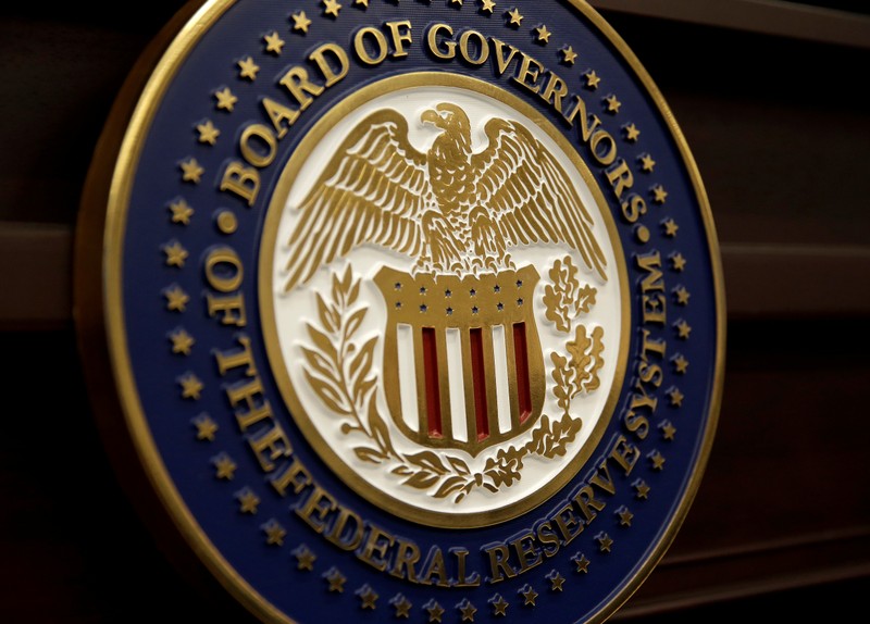 FILE PHOTO: The seal for the Board of Governors of the Federal Reserve System is displayed in Washington