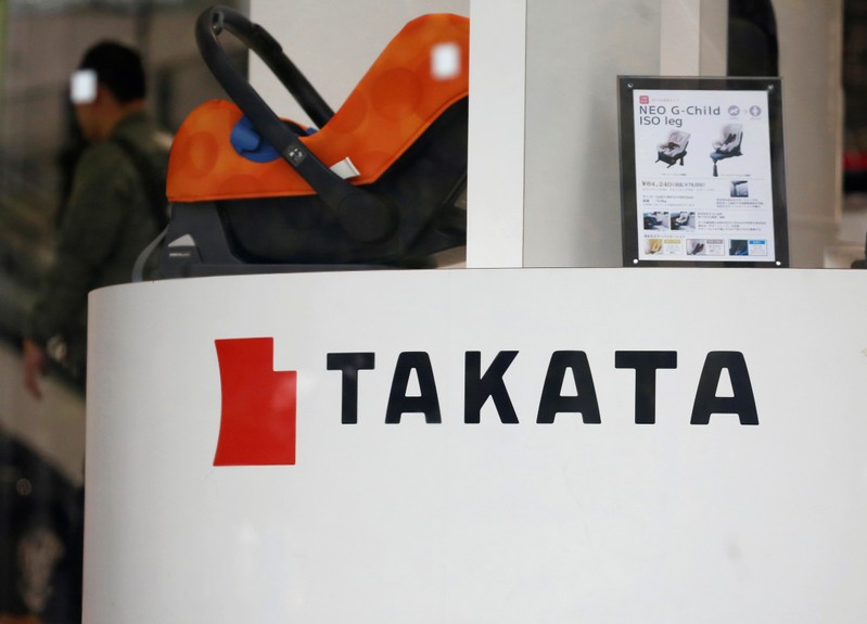 Logo of Takata Corp is seen on its display at a showroom for vehicles in Tokyo