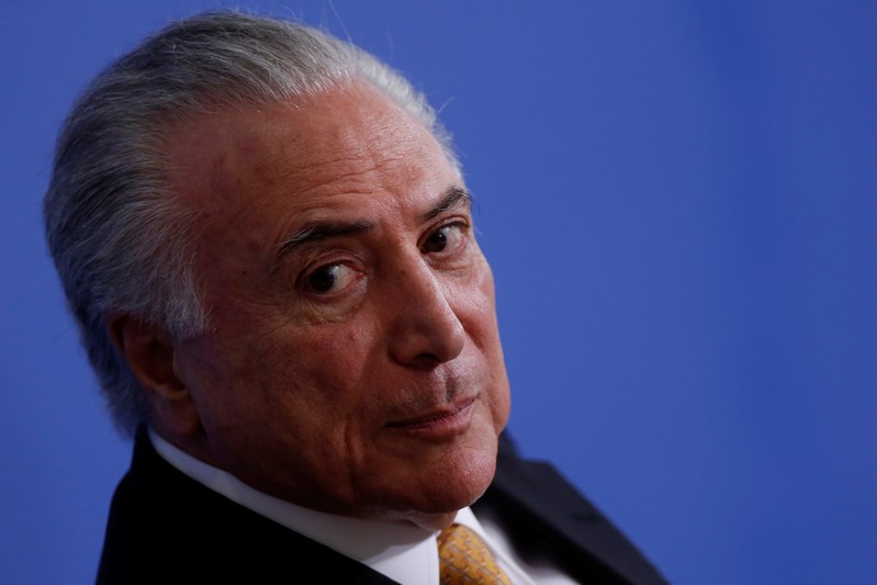 Brazil's President Michel Temer reacts during a Solemnity of Delivery of the National Order of Scientific Merit, at the Planalto Palace, in Brasilia