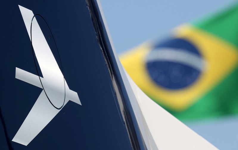 The Embraer logo is seen during the LABACE fair in Sao Paulo