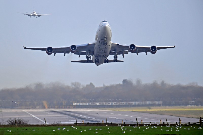 An airplane takes off at Gatwick Airport, after the airport reopened to flights following its forced closure because of drone activity, in Gatwick