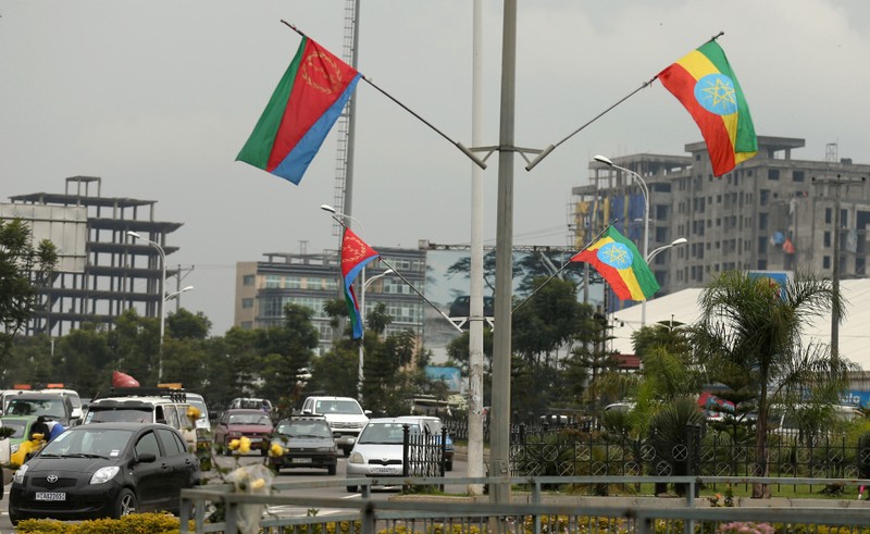 FILE PHOTO: Ethiopia's and Eritrea's flags are displayed on the street ahead of Eritrea's President Isaias Afwerki's visit to Addis Ababa