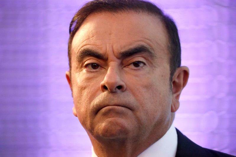 FILE PHOTO - Carlos Ghosn, Chairman and CEO of the Renault-Nissan Alliance, attends a news conference to unveil Renault's next mid-term strategic plan in Paris
