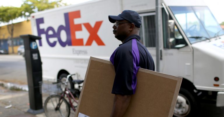 FedEx tumbles after lowering earnings guidance, cites global trade slowdown