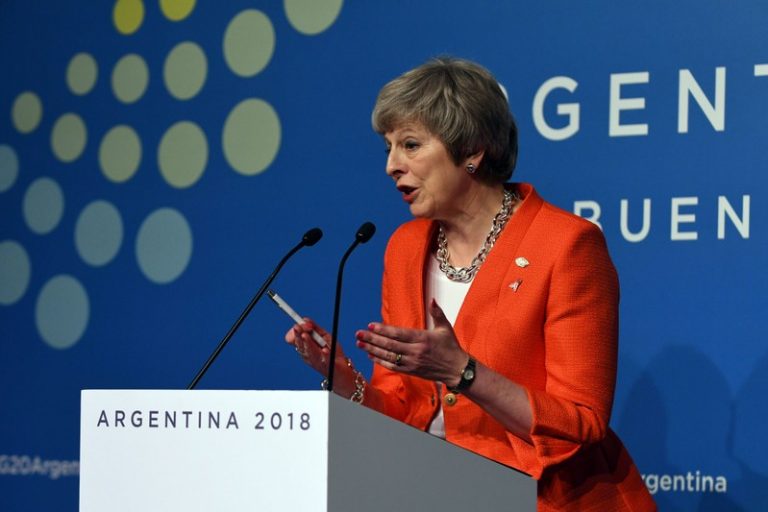 Hoping to win Brexit support, PM May says world leaders ready for trade